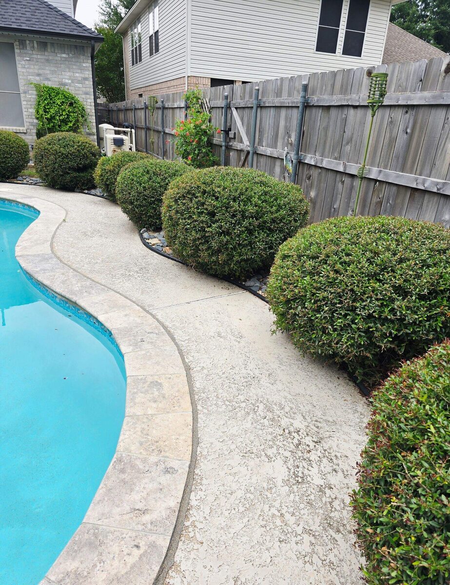 Landscaped pool deck before